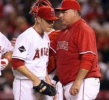 Scott Kazmir a Mike Scioscia